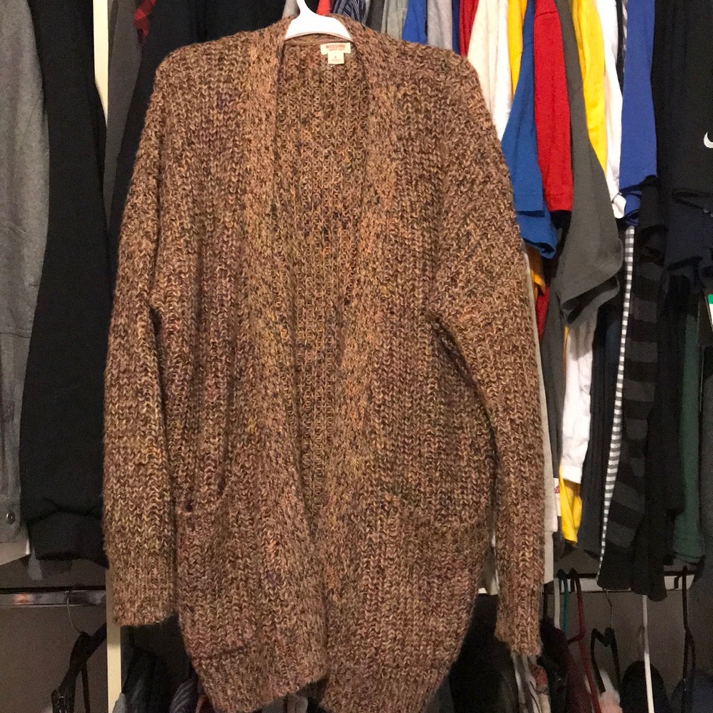 Small knitted warm and comfy sweater